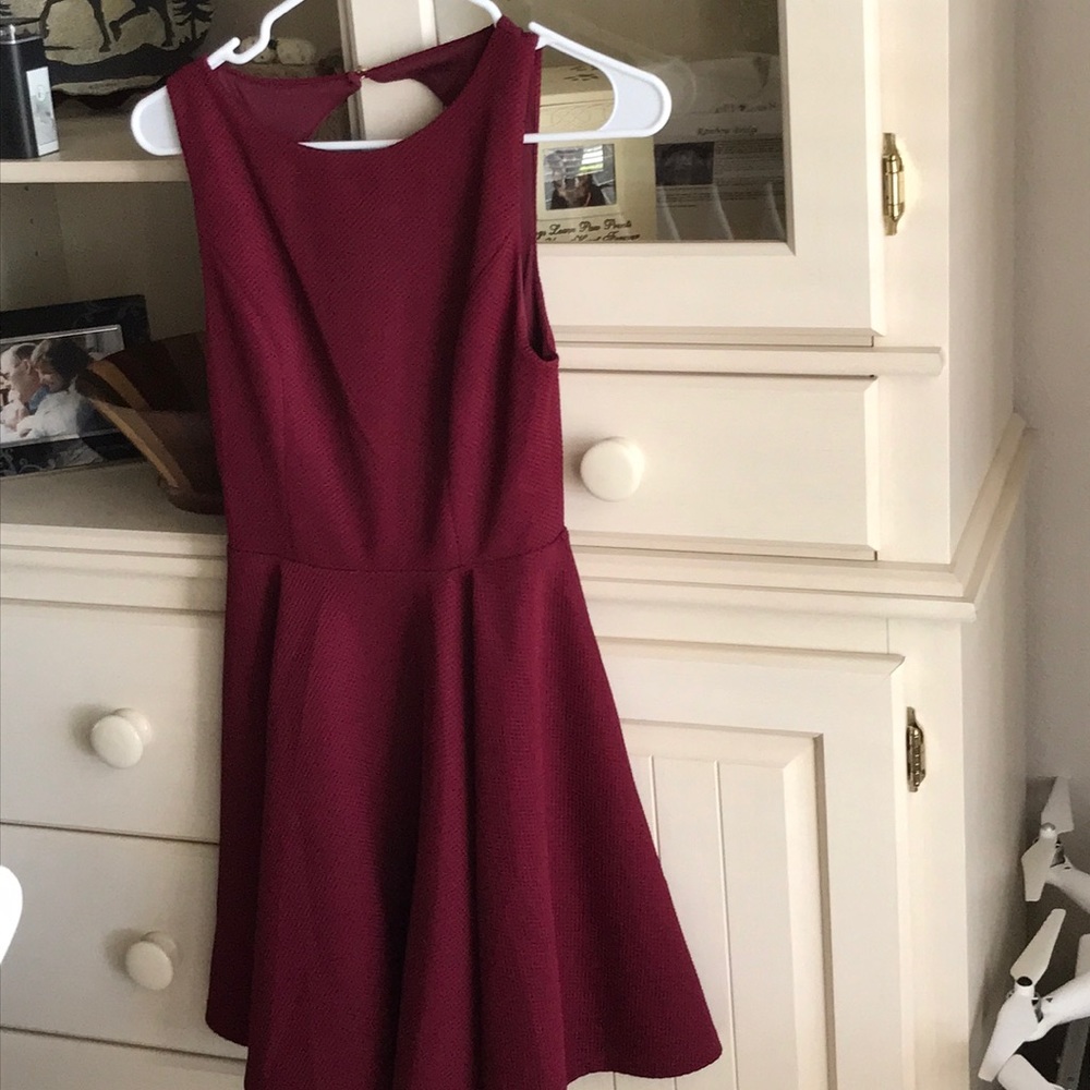 Merlot colored skater dress with cutout back